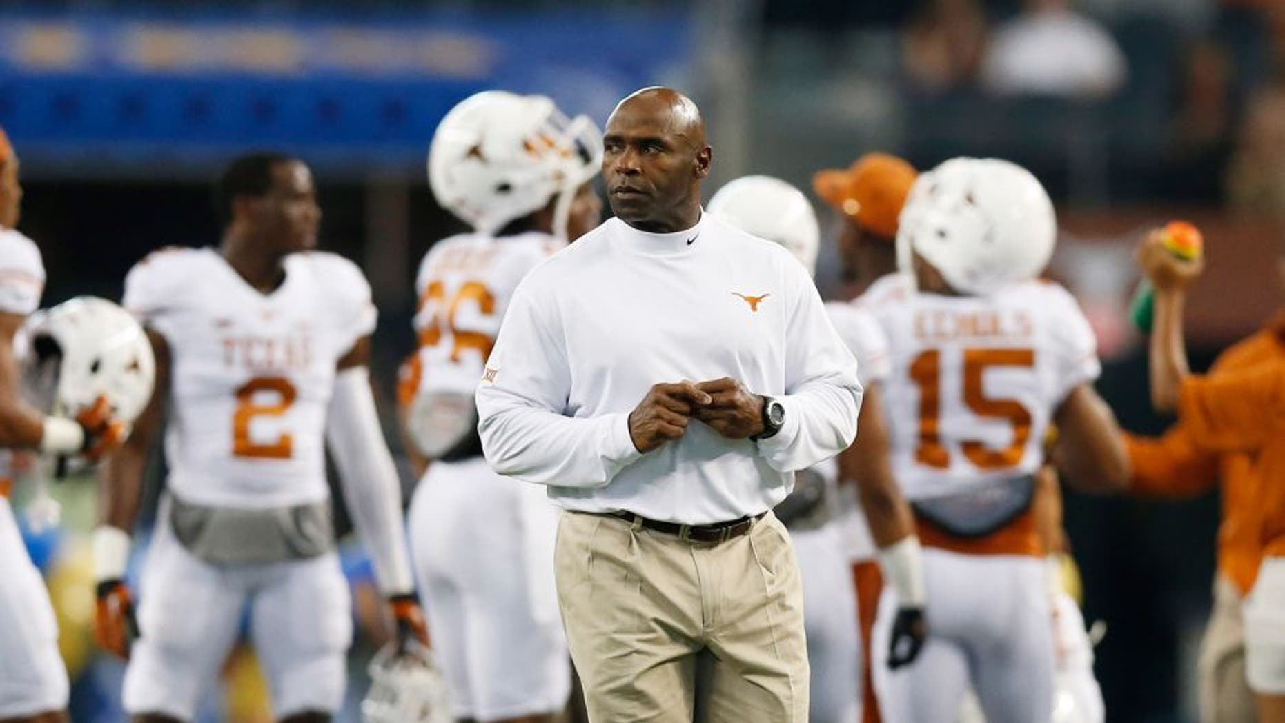 Sep 13, 2014; Arlington, TX, USA; Texas Longhorns head coach Charlie Strong on the field before the game against the UCLA Bruins at AT&T Stadium. Mandatory Credit: Matthew Emmons-USA TODAY Sports