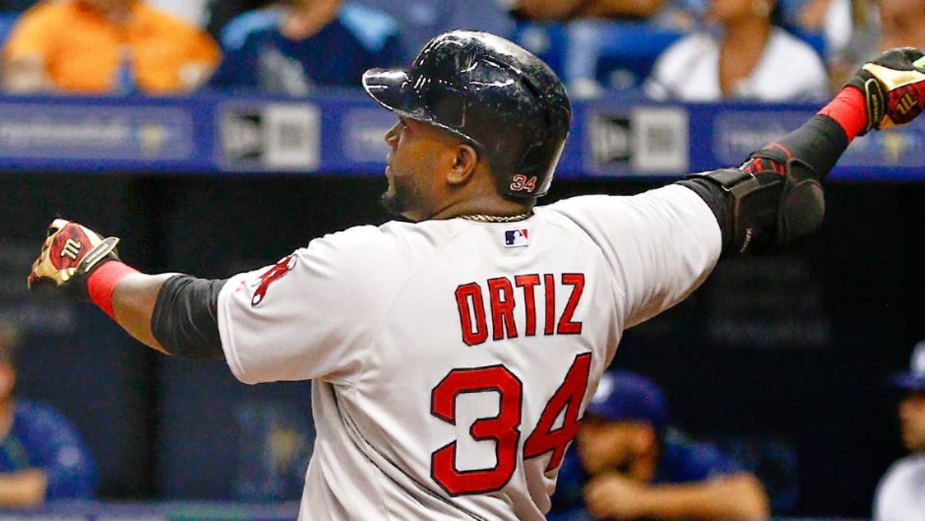 Sep 12, 2015; St. Petersburg, FL, USA; Boston Red Sox designated hitter David Ortiz (34) hits his 500th home run during the fifth inning of a baseball game against the Tampa Bay Rays at Tropicana Field. Mandatory Credit: Reinhold Matay-USA TODAY Sports