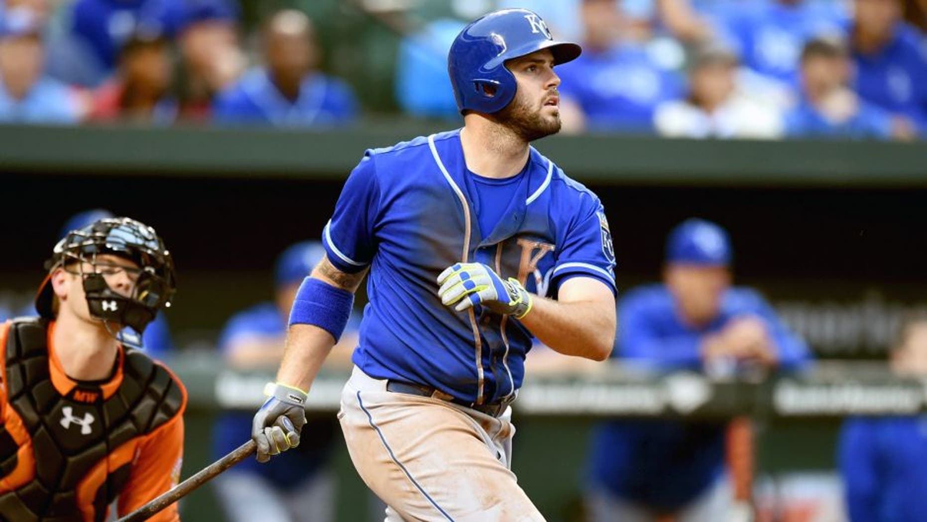 BALTIMORE, MD - SEPTEMBER 12: Mike Moustakas #8 of the Kansas City Royals hits a grand slam in the seventh inning during a baseball game against the Baltimore Orioles at Oriole Park at Camden Yards on September 12, 2015 in Baltimore, Maryland. (Photo by Mitchell Layton/Getty Images)