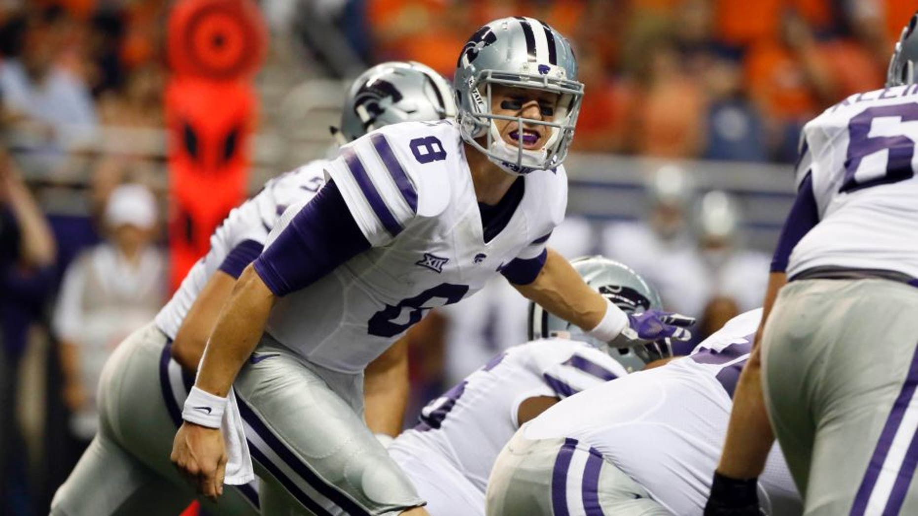 Sep 12, 2015; San Antonio, TX, USA; Kansas State Wildcats quarterback Joe Hubener (8) yells to the line against the UTSA Roadrunners during the first half at Alamodome. Mandatory Credit: Soobum Im-USA TODAY Sports