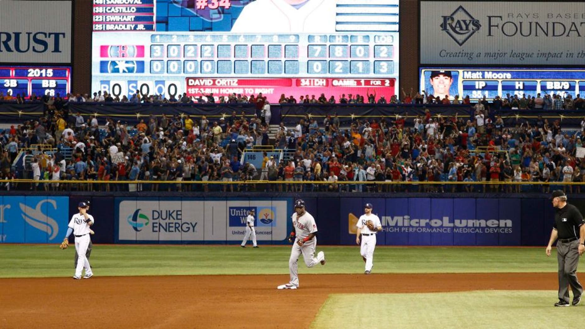 Sep 12, 2015; St. Petersburg, FL, USA; Boston Red Sox designated hitter David Ortiz (34) rounds second base after he hits his 500th home run during the fifth inning of a baseball game against the Tampa Bay Rays at Tropicana Field. Mandatory Credit: Reinhold Matay-USA TODAY Sports