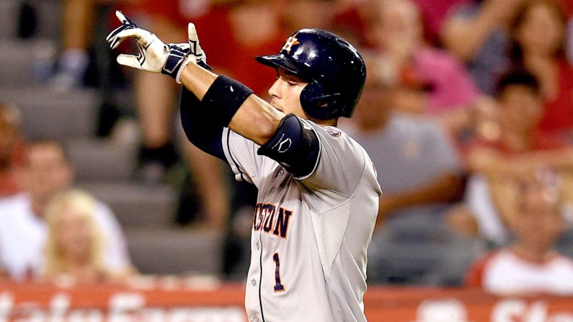 Sep 12, 2015; Anaheim, CA, USA; Houston Astros shortstop Carlos Correa (1) reacts as he runs towards home after hitting a solo home run against the Los Angeles Angels during the sixth inning at Angel Stadium of Anaheim. Mandatory Credit: Kelvin Kuo-USA TODAY Sports
