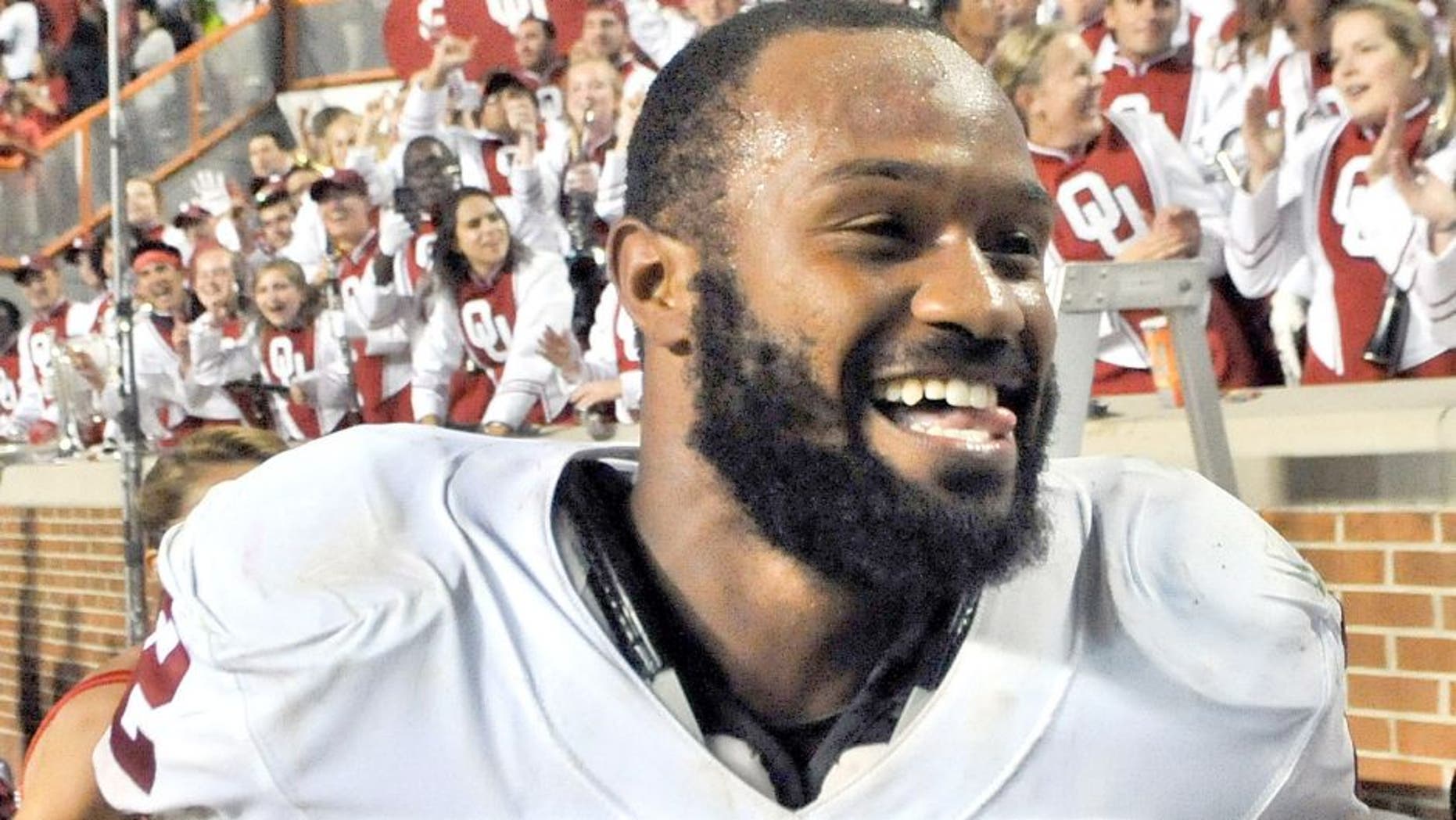 Sep 12, 2015; Knoxville, TN, USA; Oklahoma Sooners running back Samaje Perine (32) runs off the field after defeating the Tennessee Volunteers during double overtime Neyland Stadium. Oklahoma won 31-24. Mandatory Credit: Jim Brown-USA TODAY Sports