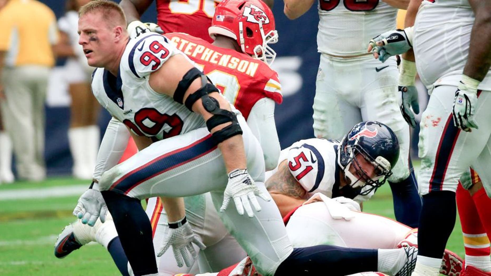 Sep 13, 2015; Houston, TX, USA; Houston Texans defensive end J.J. Watt (99) reacts after making a sack during the first half against the Kansas City Chiefs at NRG Stadium. Mandatory Credit: Kevin Jairaj-USA TODAY Sports