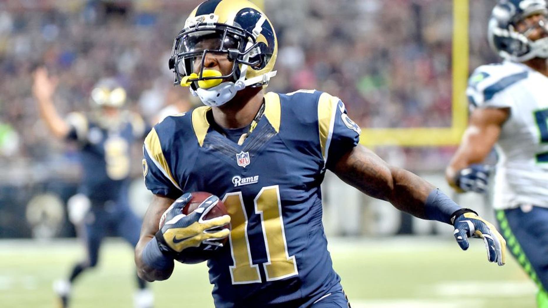 Sep 13, 2015; St. Louis, MO, USA; St. Louis Rams wide receiver Tavon Austin (11) scores a touch down against the Seattle Seahawks during the first half at the Edward Jones Dome. Mandatory Credit: Jasen Vinlove-USA TODAY Sports