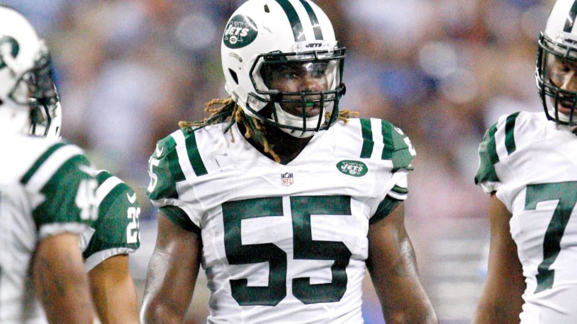 Aug 13, 2015; Detroit, MI, USA; New York Jets outside linebacker Lorenzo Mauldin (55) walks back to the huddle after a play during the second quarter of a preseason NFL football game against the Detroit Lions at Ford Field. Mandatory Credit: Raj Mehta-USA TODAY Sports