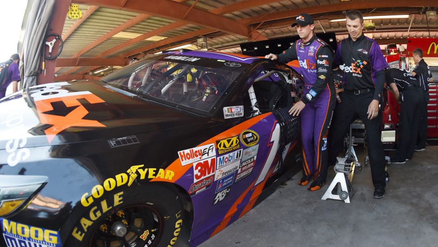 Tough guy: Denny Hamlin doesn't let ACL injury slow him ...
