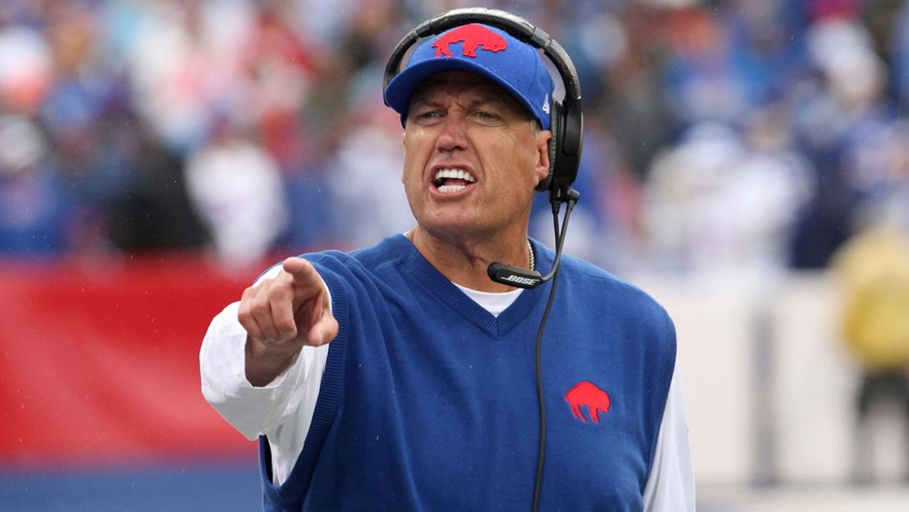 Sep 13, 2015; Orchard Park, NY, USA; Buffalo Bills head coach Rex Ryan yells to players on the bench during the second half against the Indianapolis Colts at Ralph Wilson Stadium. Bills beat the Colts 27 to 14. Mandatory Credit: Timothy T. Ludwig-USA TODAY Sports