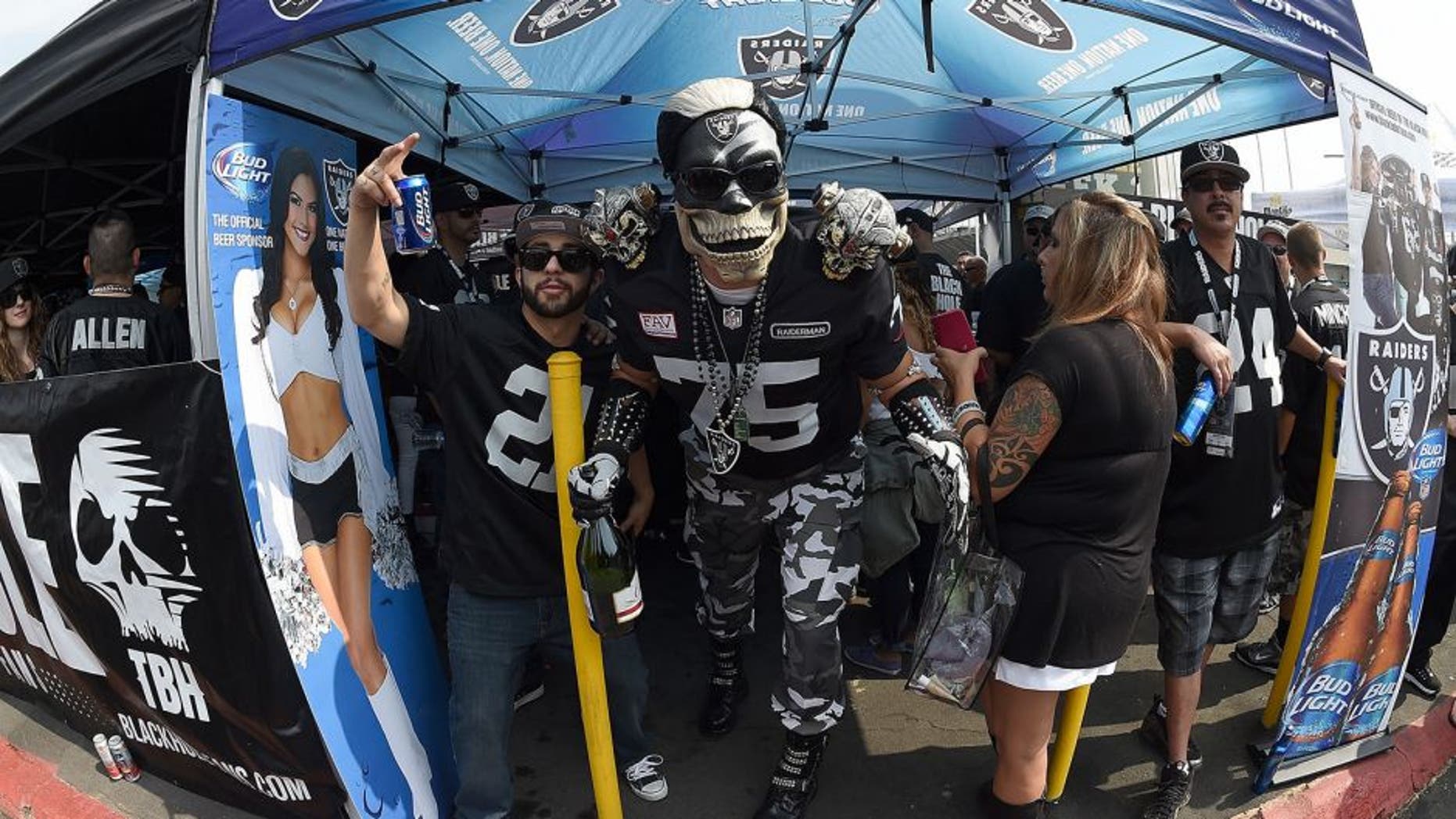 OAKLAND, CA - SEPTEMBER 13: Fans tailgating in the parking lot prior to the Cincinnati Bengals v Oakland Raiders NFL football game at the O.co Coliseum on September 13, 2015 in Oakland, California. (Photo by Thearon W. Henderson/Getty Images)