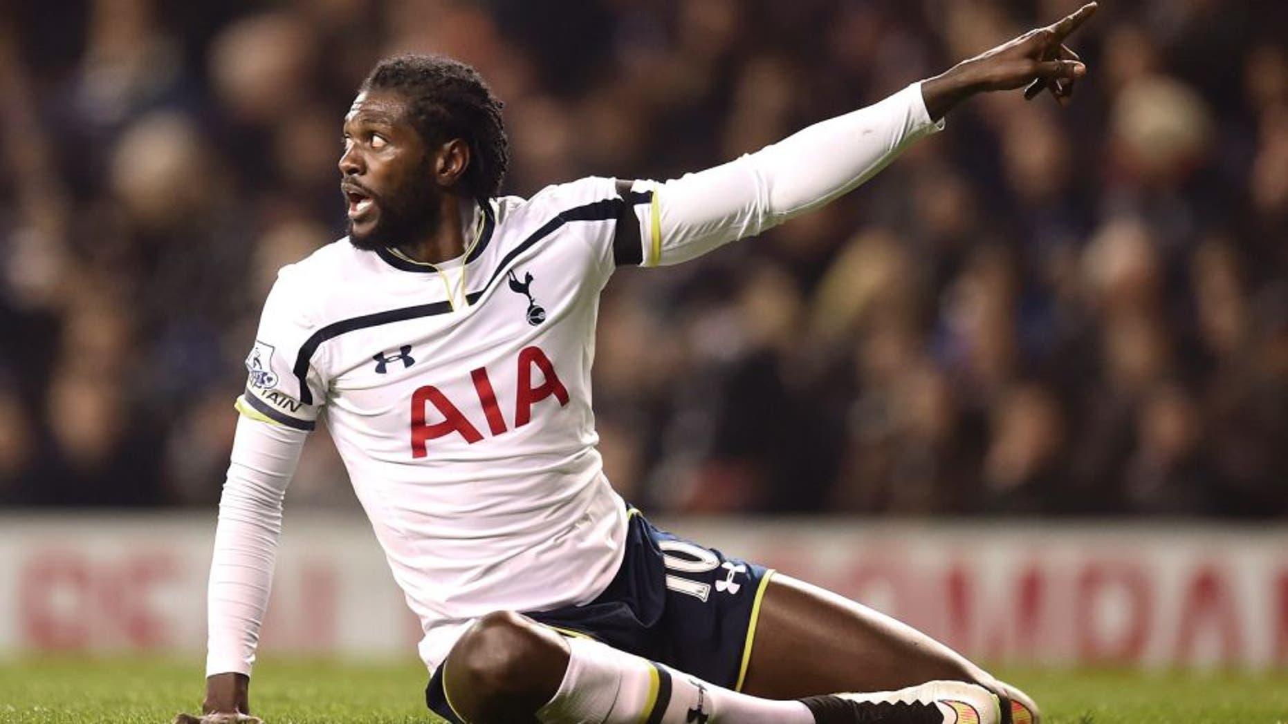 LONDON, ENGLAND - JANUARY 21: Emmanuel Adebayour of Spurs reacts during the Capital One Cup Semi-Final first leg match between Tottenham Hotspur and Sheffield United at White Hart Lane on January 21, 2015 in London, England. (Photo by Jamie McDonald/Getty Images)