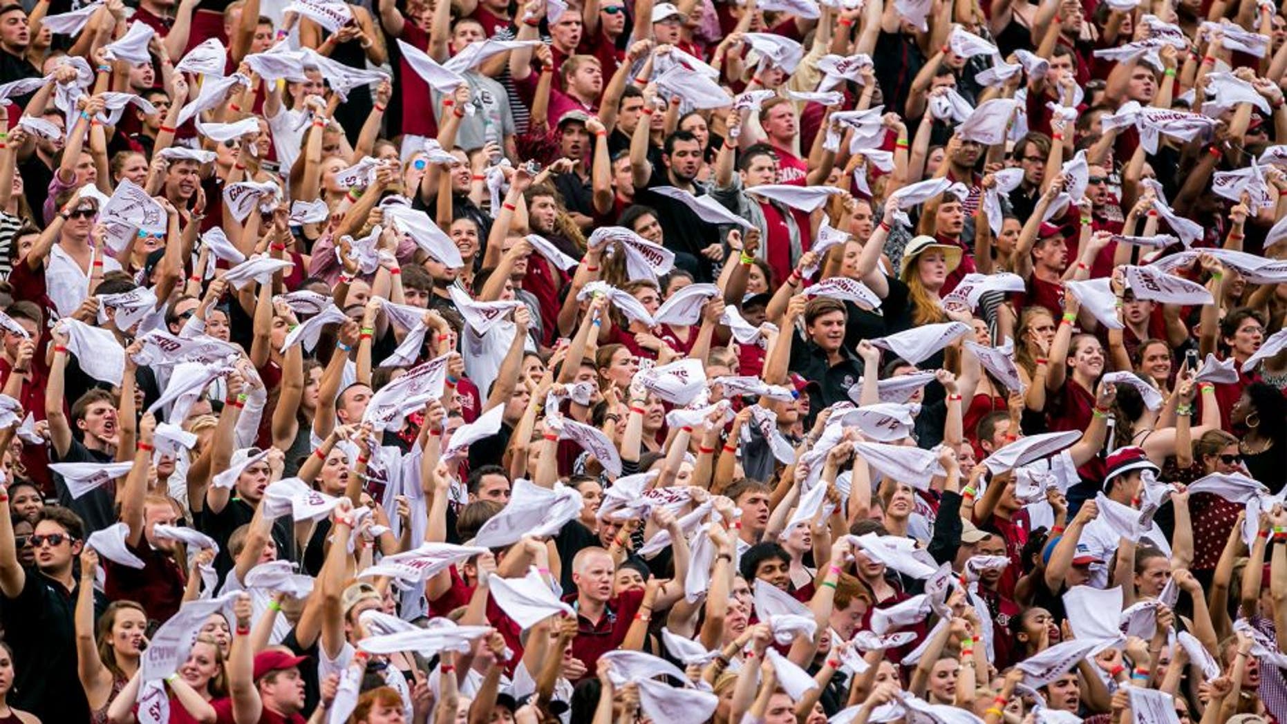 Sep 13, 2014; Columbia, SC, USA; South Carolina Gamecocks fans wave towels in the game against the Georgia Bulldogs in the first quarter at Williams-Brice Stadium. Mandatory Credit: Jeff Blake-USA TODAY Sports