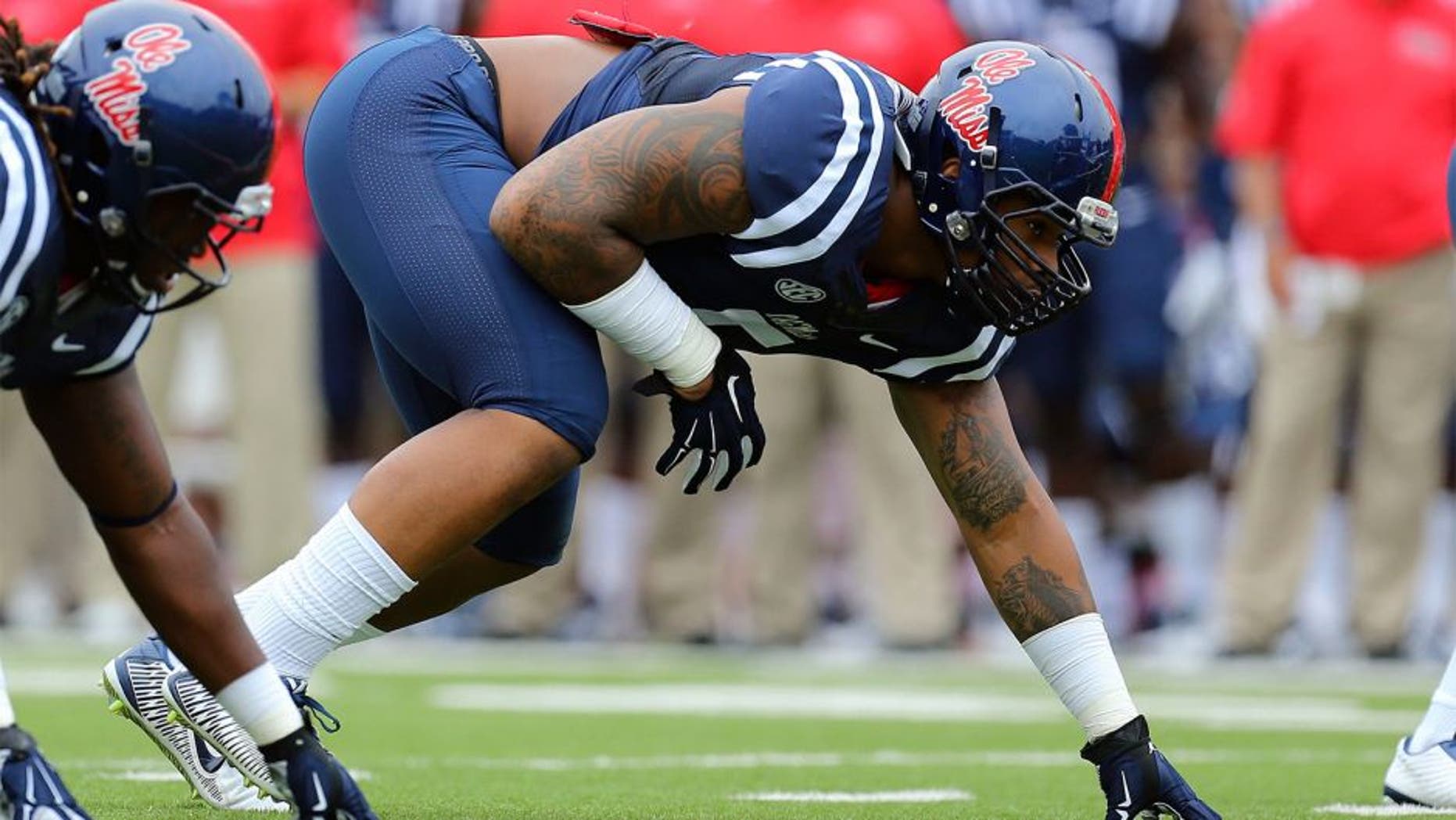 Sep 13, 2014; Oxford, MS, USA; Mississippi Rebels defensive tackle Robert Nkemdiche (5) steps up to the line during the game against the Louisiana-Lafayette Ragin Cajuns at Vaught-Hemingway Stadium. Mandatory Credit: Spruce Derden-USA TODAY Sports
