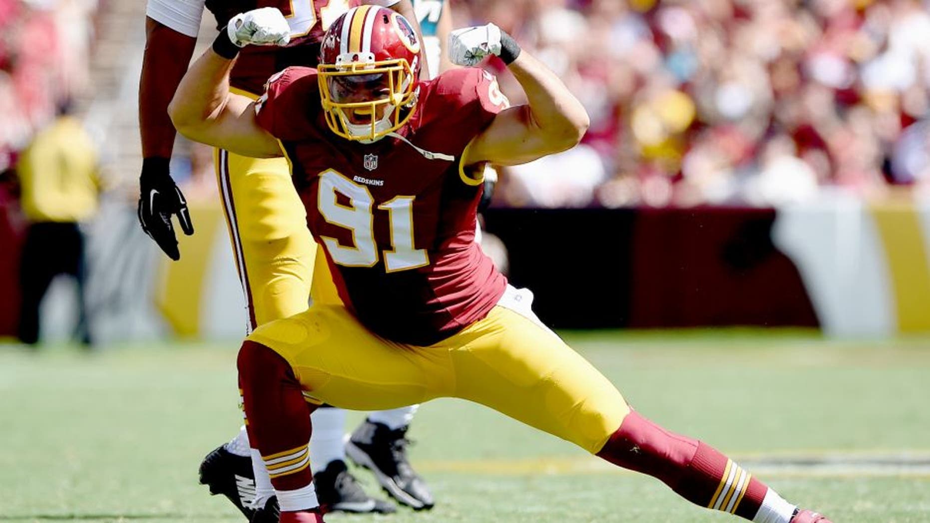 LANDOVER, MD - SEPTEMBER 14: Outside linebacker Ryan Kerrigan #91 of the Washington Redskins celebreates after recording a second quarter sack during a game against the Jacksonville Jaguars at FedExField on September 14, 2014 in Landover, Maryland. (Photo by Patrick Smith/Getty Images)