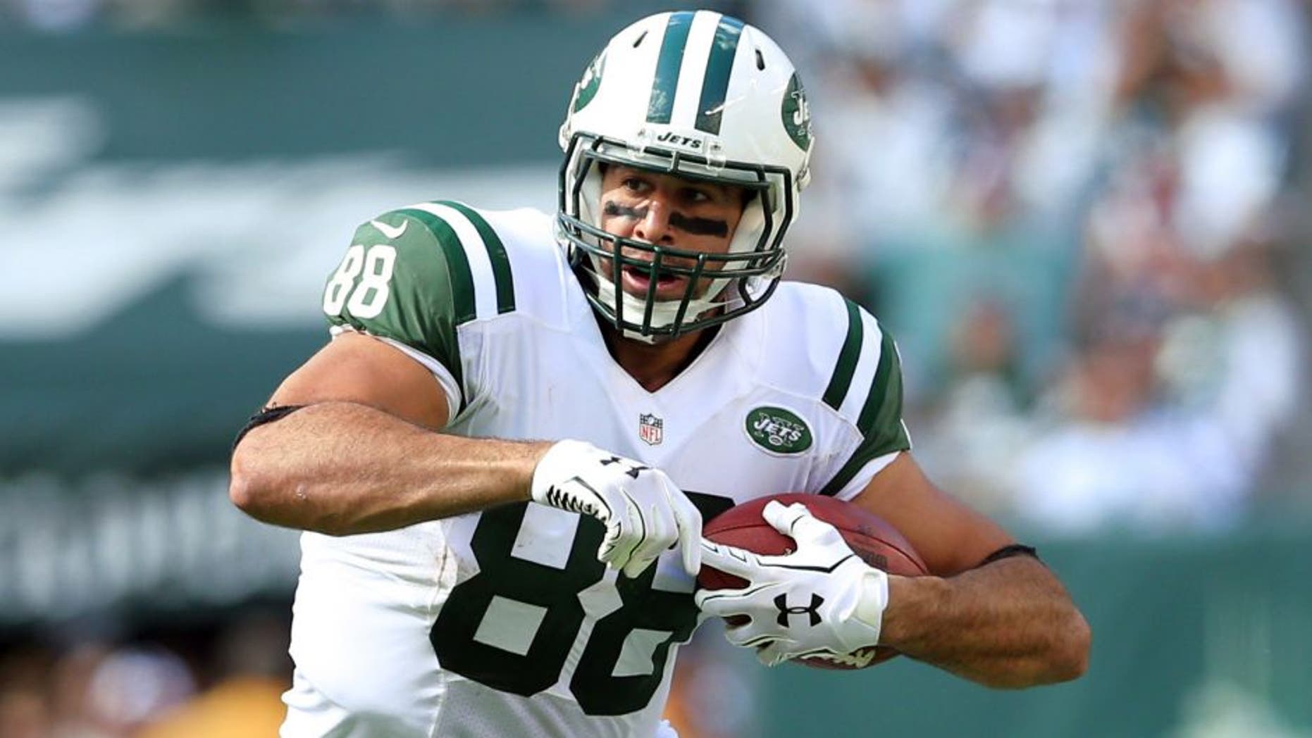 Sep 7, 2014; East Rutherford, NJ, USA; New York Jets tight end Jace Amaro (88) runs with the ball against the Oakland Raiders during a game at MetLife Stadium. The Jets defeated the Raiders 19-14. Mandatory Credit: Brad Penner-USA TODAY Sports