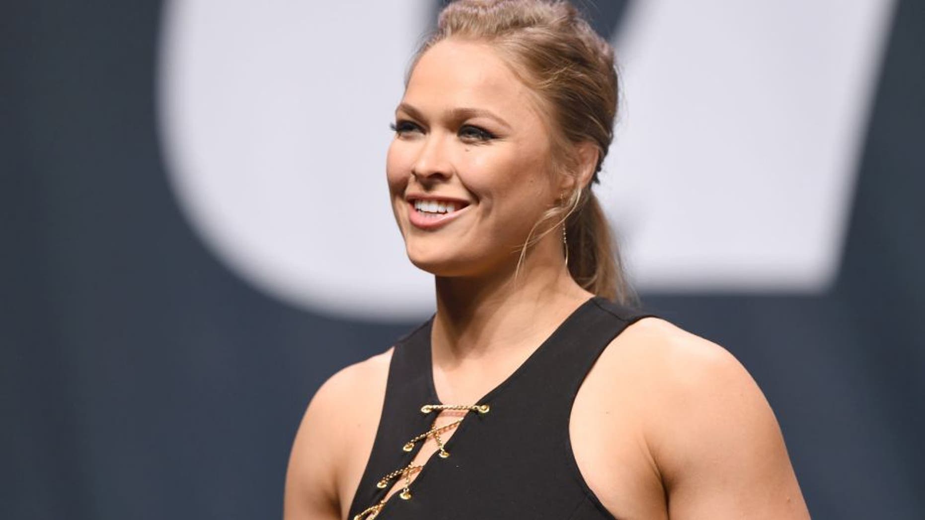 LAS VEGAS, NV - SEPTEMBER 04: UFC women's bantamweight champion Ronda Rousey speaks to the fans during the UFC's Go Big launch event inside MGM Grand Garden Arena on September 4, 2015 in Las Vegas, Nevada. (Photo by Josh Hedges/Zuffa LLC/Zuffa LLC via Getty Images)