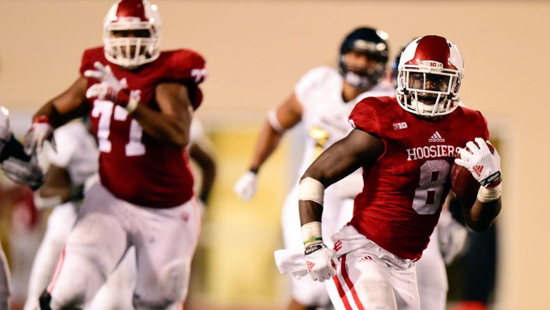 Sep 12, 2015; Bloomington, IN, USA; Indiana Hoosiers running back Jordan Howard (8) runs the ball towards the end zone during the second half of the game at Memorial Stadium. The Indiana Hoosiers defeated the Florida International Golden Panthers 36-22. Mandatory Credit: Marc Lebryk-USA TODAY Sports