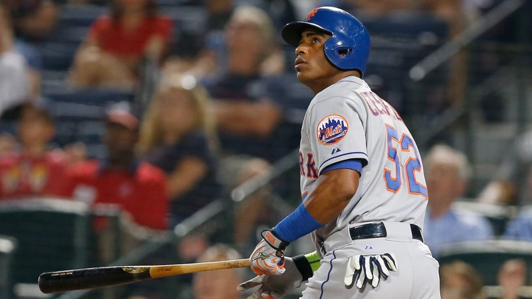 ATLANTA, GA - SEPTEMBER 11: Centerfielder Yoenis Cespedes #52 of the New York Mets hits a 2-run home run in the eighth inning during the game against the Atlanta Braves at Turner Field on September 11, 2015 in Atlanta, Georgia. (Photo by Mike Zarrilli/Getty Images)