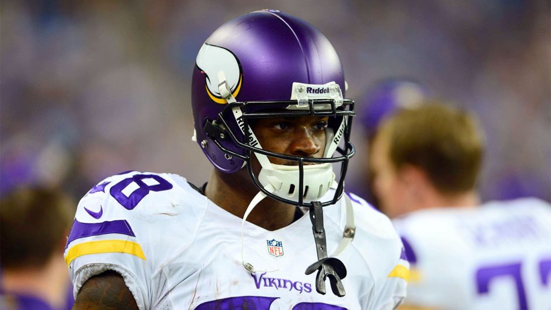 Sep 8, 2013; Detroit, MI, USA; Minnesota Vikings running back Adrian Peterson (28) on the sidelines in the second quarter against the Detroit Lions at Ford Field. Mandatory Credit: Andrew Weber-USA TODAY Sports