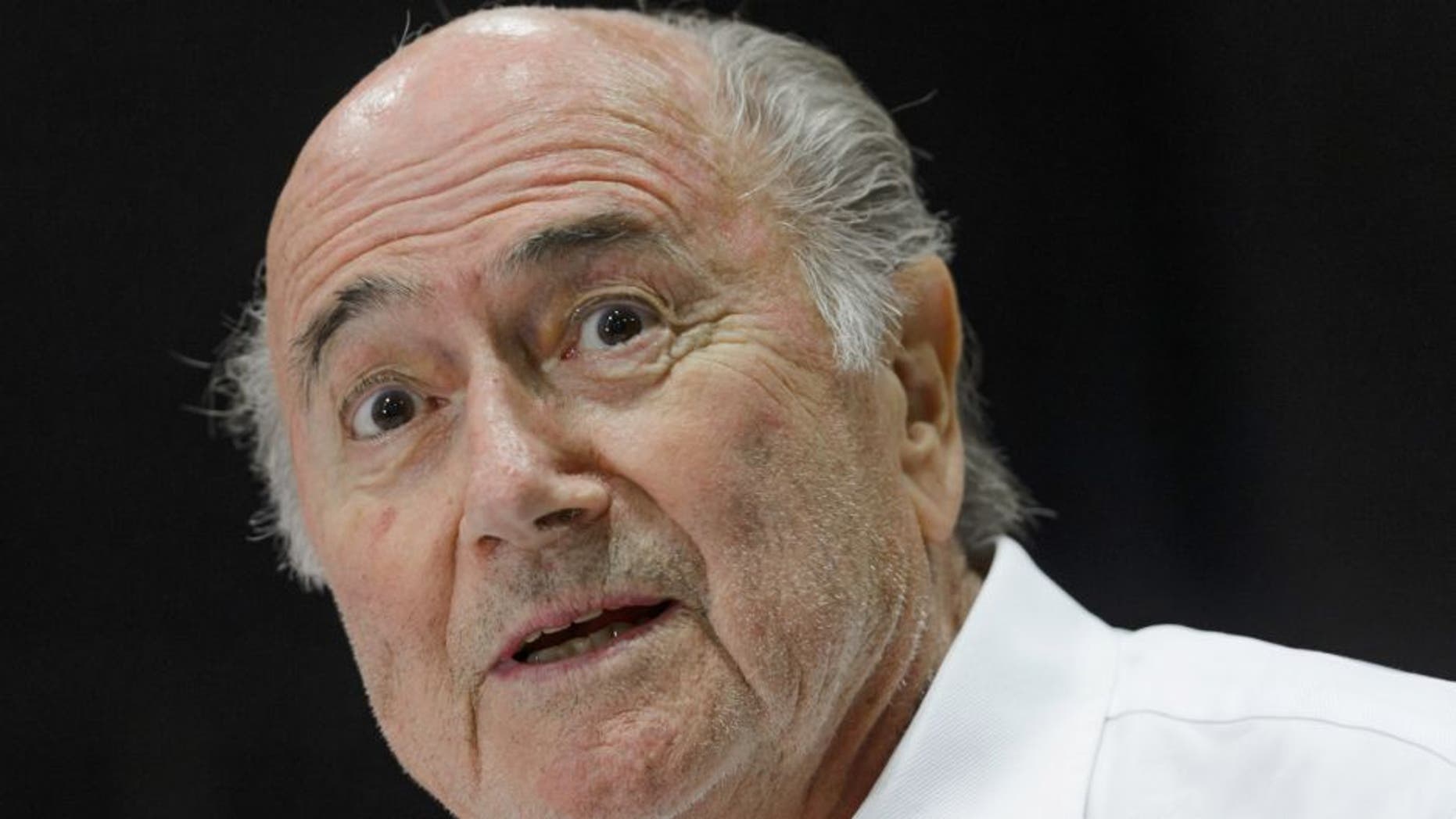 Outgoing FIFA president Sepp Blatter answers to a press conference during the "Sepp Blatter Tournament" on August 22, 2015 in Ulrichen, Blatter's hometown. When Blatter was elected FIFA President in 1998, the town awarded him with the "honorary burgher" of Ulrichen title and to commemorate the occasion, a football tournament bearing his name was created. AFP PHOTO / FABRICE COFFRINI (Photo credit should read FABRICE COFFRINI/AFP/Getty Images)