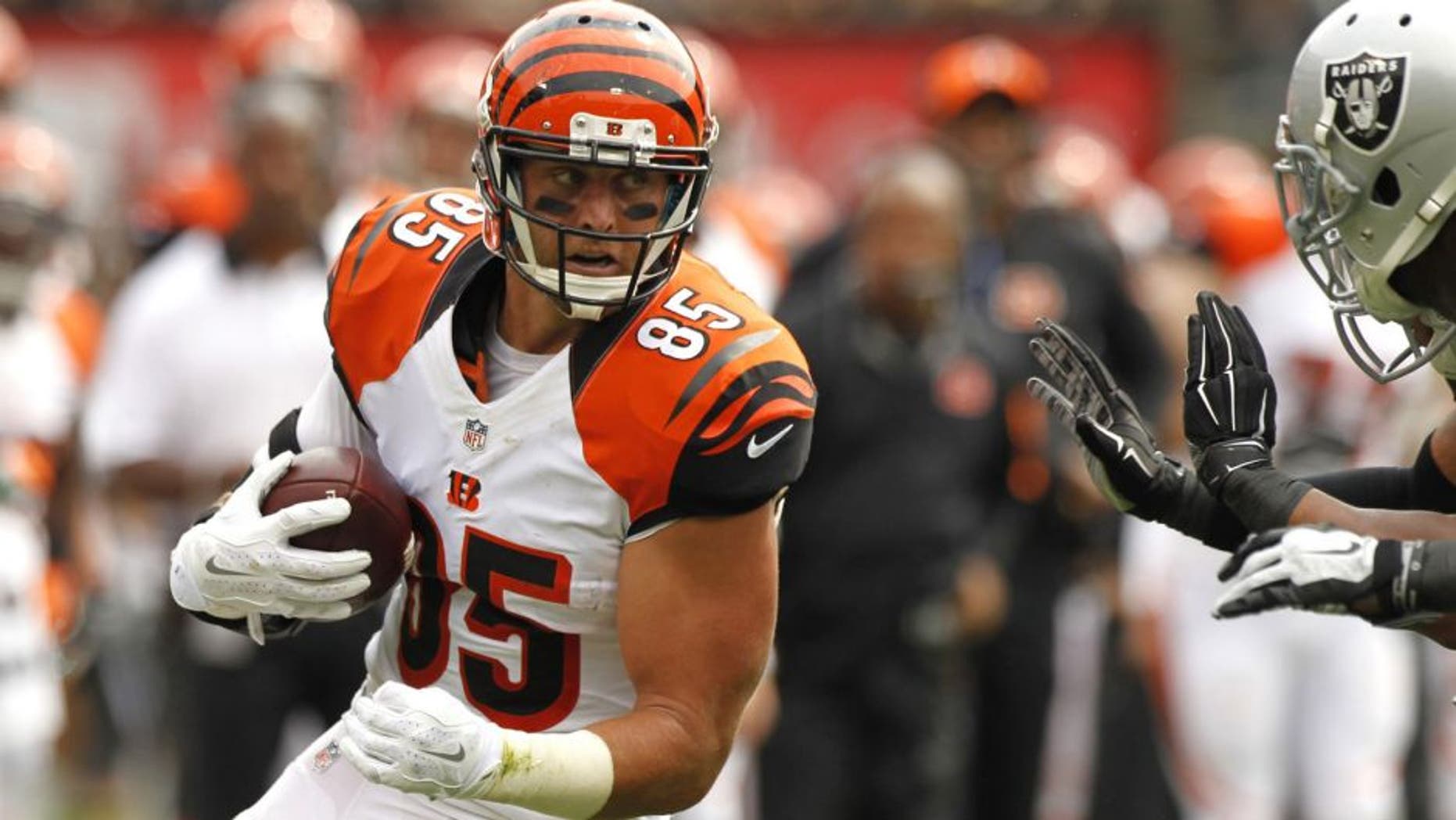 Sep 13, 2015; Oakland, CA, USA; Cincinnati Bengals tight end Tyler Eifert (85) runs with the ball after making a catch against the Oakland Raiders in the first quarter at O.co Coliseum.