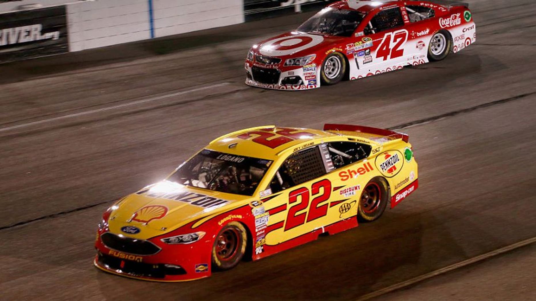 RICHMOND, VA - SEPTEMBER 10: Joey Logano, driver of the #22 Shell Pennzoil Ford, races Kyle Larson, driver of the #42 Target Chevrolet, during the NASCAR Sprint Cup Series Federated Auto Parts 400 at Richmond International Raceway on September 10, 2016 in Richmond, Virginia. (Photo by Matt Sullivan/NASCAR via Getty Images)