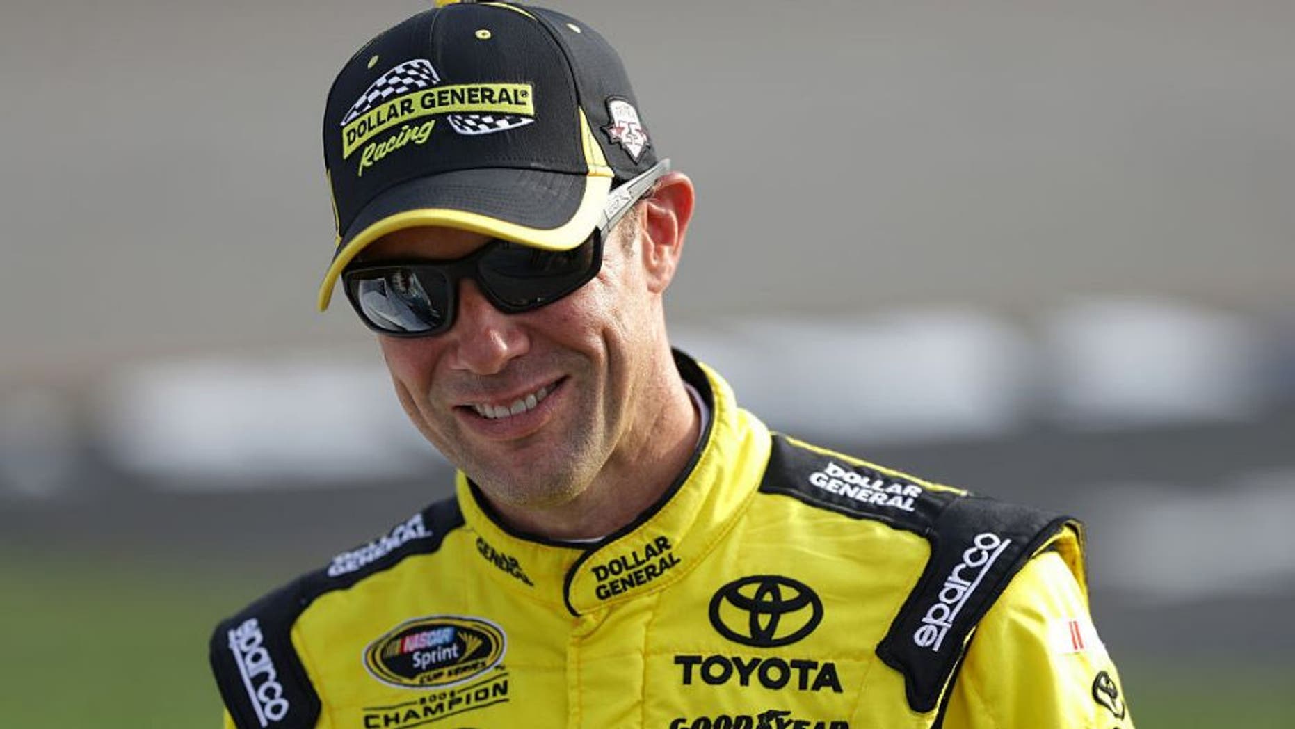 RICHMOND, VA - SEPTEMBER 09: Matt Kenseth, driver of the #20 Dollar General Toyota, stands on the grid during qualifying for the NASCAR Sprint Cup Series Federated Auto Parts 400 at Richmond International Raceway on September 9, 2016 in Richmond, Virginia. (Photo by Chris Graythen/NASCAR via Getty Images)
