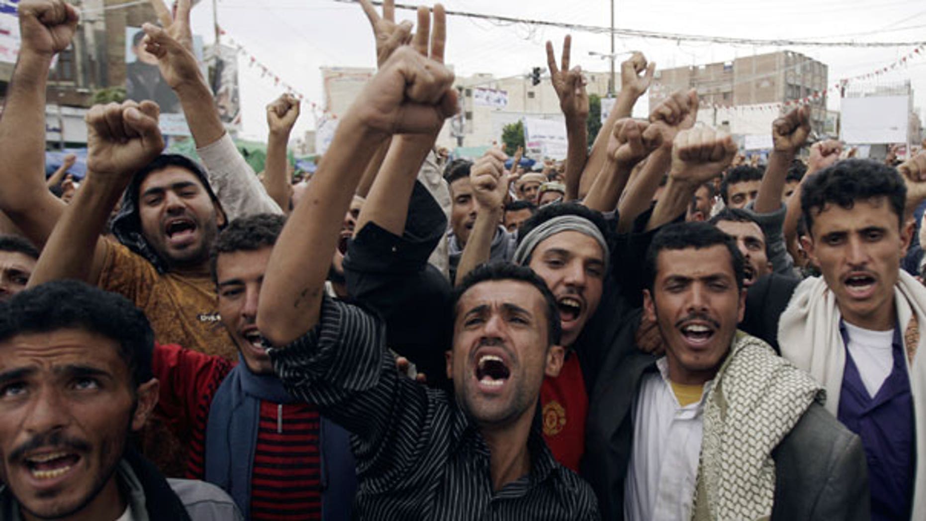 Sept. 14: Yemeni protestors chant slogans during a demonstration demanding the resignation of Yemeni president Ali Abdullah Saleh in Sanaa, Yemen.