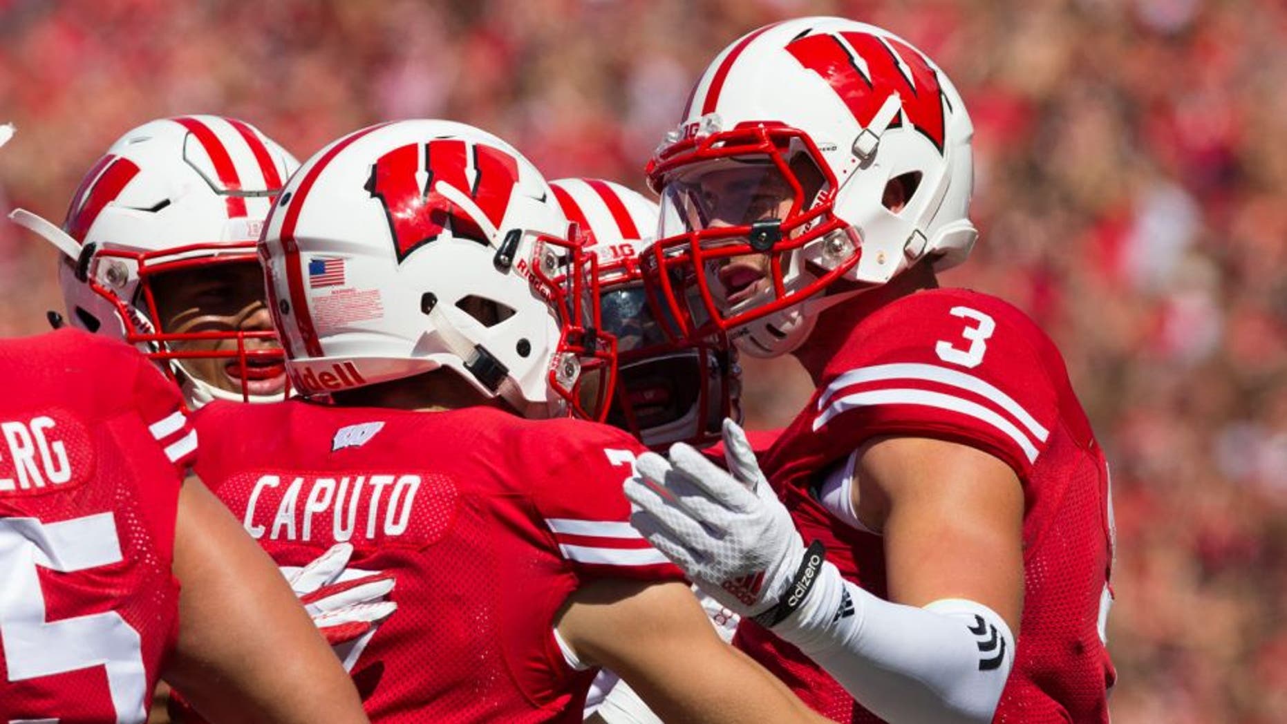 Sep 12, 2015; Madison, WI, USA; Wisconsin Badgers safety Tanner McEvoy (3) celebrates following an interception during the second quarter against the Miami (Ohio) RedHawks at Camp Randall Stadium. Mandatory Credit: Jeff Hanisch-USA TODAY Sports