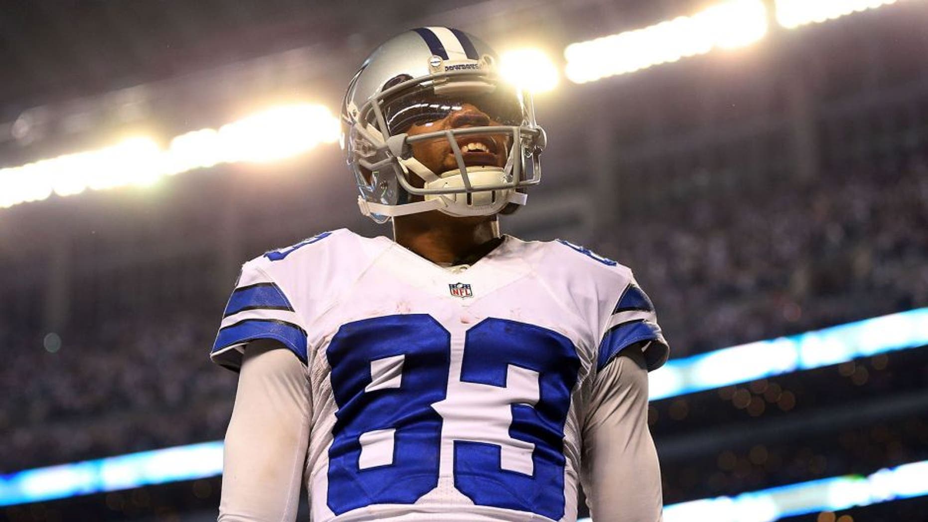 ARLINGTON, TX - JANUARY 04: Terrance Williams #83 of the Dallas Cowboys celebrates after scoring a touchdown against the Detroit Lions during the second half of their NFC Wild Card Playoff game at AT&T Stadium on January 4, 2015 in Arlington, Texas. (Photo by Ronald Martinez/Getty Images)