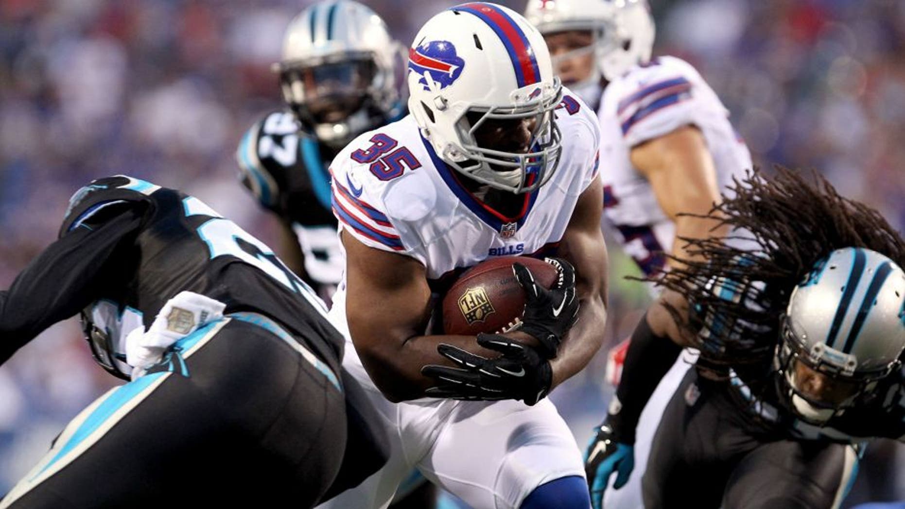 Aug 14, 2015; Orchard Park, NY, USA; Buffalo Bills running back Bryce Brown (35) runs the ball during the first half against the Carolina Panthers in a preseason NFL football game at Ralph Wilson Stadium. Mandatory Credit: Timothy T. Ludwig-USA TODAY Sports