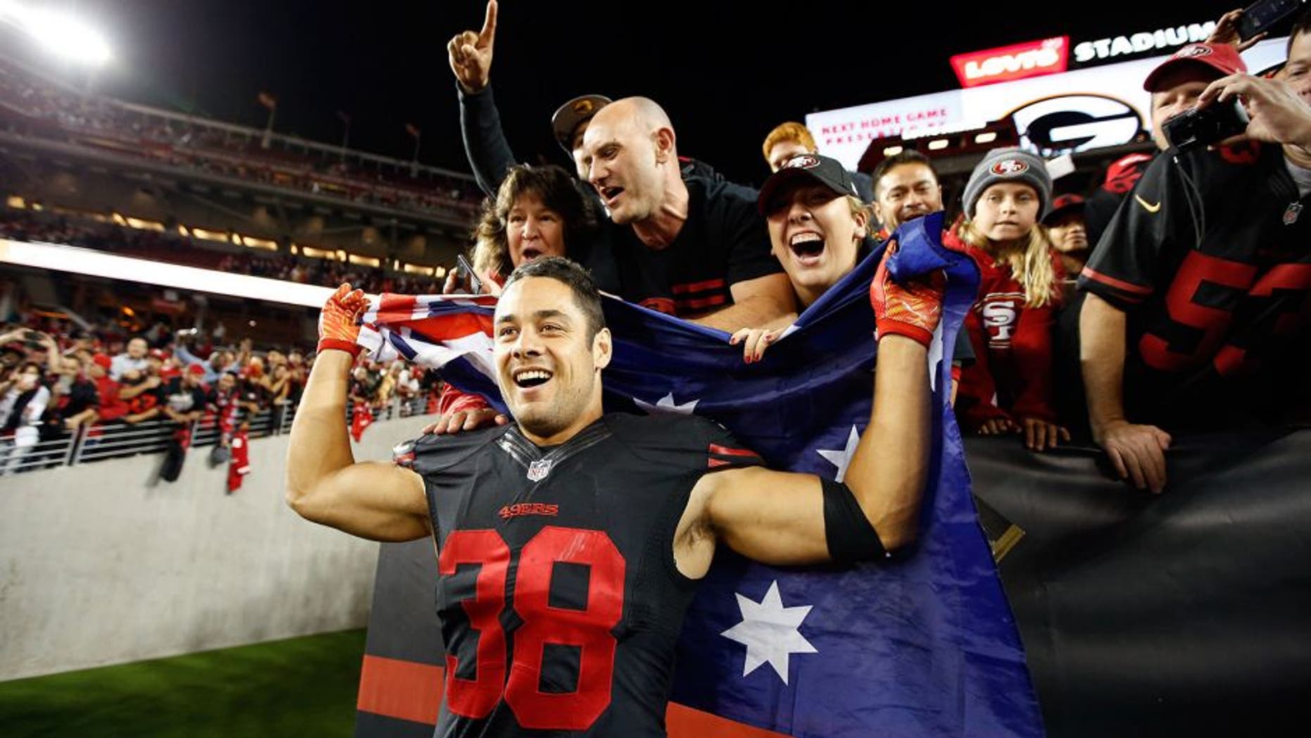 SANTA CLARA, CA - SEPTEMBER 14: Jarryd Hayne #38 of the San Francisco 49ers poses with fans after the 49ers beat the Minnesota Vikings in their NFL game at Levi's Stadium on September 14, 2015 in Santa Clara, California. (Photo by Ezra Shaw/Getty Images)