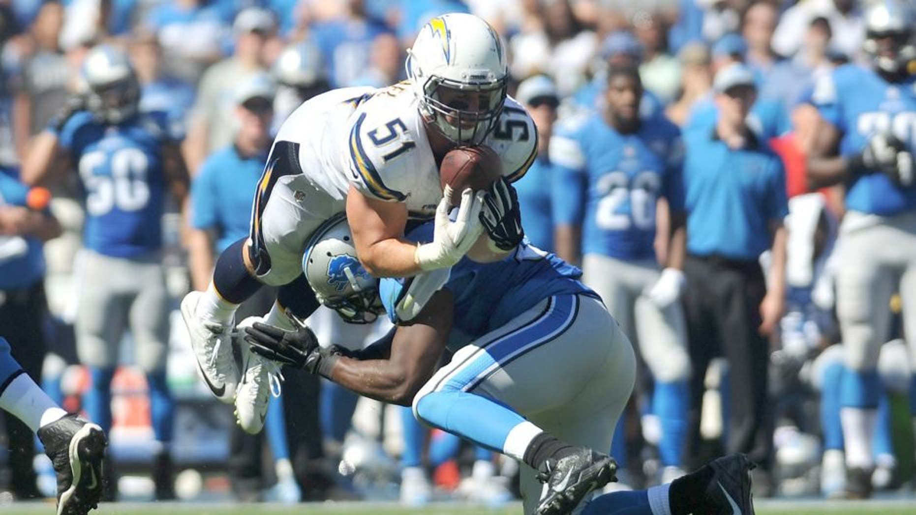 Sep 13, 2015; San Diego, CA, USA; San Diego Chargers linebacker Kyle Emanuel (51) intercepts a pass against the Detroit Lions during the second half the game at Qualcomm Stadium. Mandatory Credit: Orlando Ramirez-USA TODAY Sports