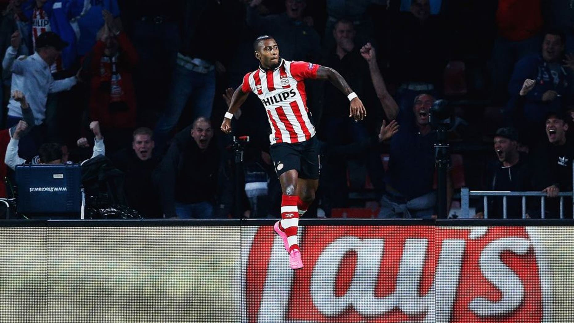 EINDHOVEN, NETHERLANDS - SEPTEMBER 15: Luciano Narsingh of PSV Eindhoven celebrates scoring his team's second goal during the UEFA Champions League Group B match between PSV Eindhoven and Manchester United at PSV Stadion on September 15, 2015 in Eindhoven, Netherlands. (Photo by Dean Mouhtaropoulos/Getty Images)
