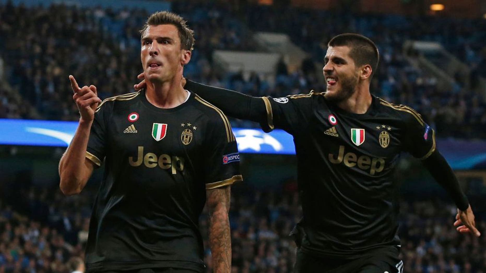 Football - Manchester City v Juventus - UEFA Champions League Group Stage - Group D - Etihad Stadium, Manchester, England - 15/9/15 Mario Mandzukic celebrates with Alvaro Morata after scoring the first goal for Juventus Reuters / Phil Noble Livepic EDITORIAL USE ONLY.