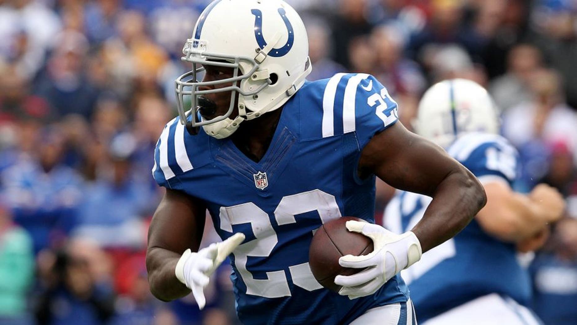 Sep 13, 2015; Orchard Park, NY, USA; Indianapolis Colts running back Frank Gore (23) runs the ball during the first half against the Buffalo Bills at Ralph Wilson Stadium. Mandatory Credit: Timothy T. Ludwig-USA TODAY Sports
