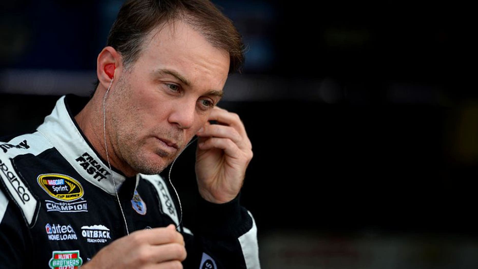 BROOKLYN, MI - AUGUST 27: Kevin Harvick, driver of the #4 Jimmy John's Chevrolet, stands in the garage area during practice for the NASCAR Sprint Cup Series Pure Michigan 400 at Michigan International Speedway on August 27, 2016 in Brooklyn, Michigan. (Photo by Robert Laberge/Getty Images)