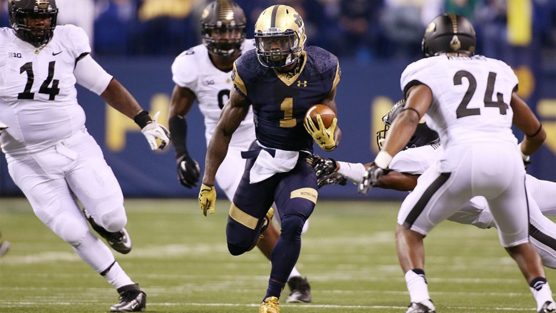 Sep 13, 2014; Indianapolis, IN, USA; Notre Dame Fighting Irish running back Greg Bryant (1) runs with the ball against the Purdue Boilermakers at Lucas Oil Stadium. Mandatory Credit: Brian Spurlock-USA TODAY Sports