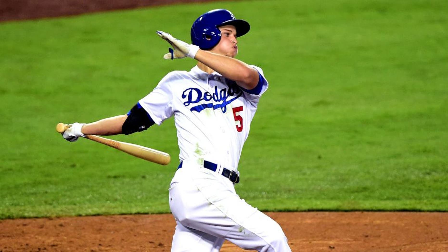 LOS ANGELES, CA - SEPTEMBER 15: Corey Seager #5 of the Los Angeles Dodgers takes a swing during the seventh inning against the Colorado Rockies at Dodger Stadium on September 15, 2015 in Los Angeles, California. (Photo by Harry How/Getty Images)