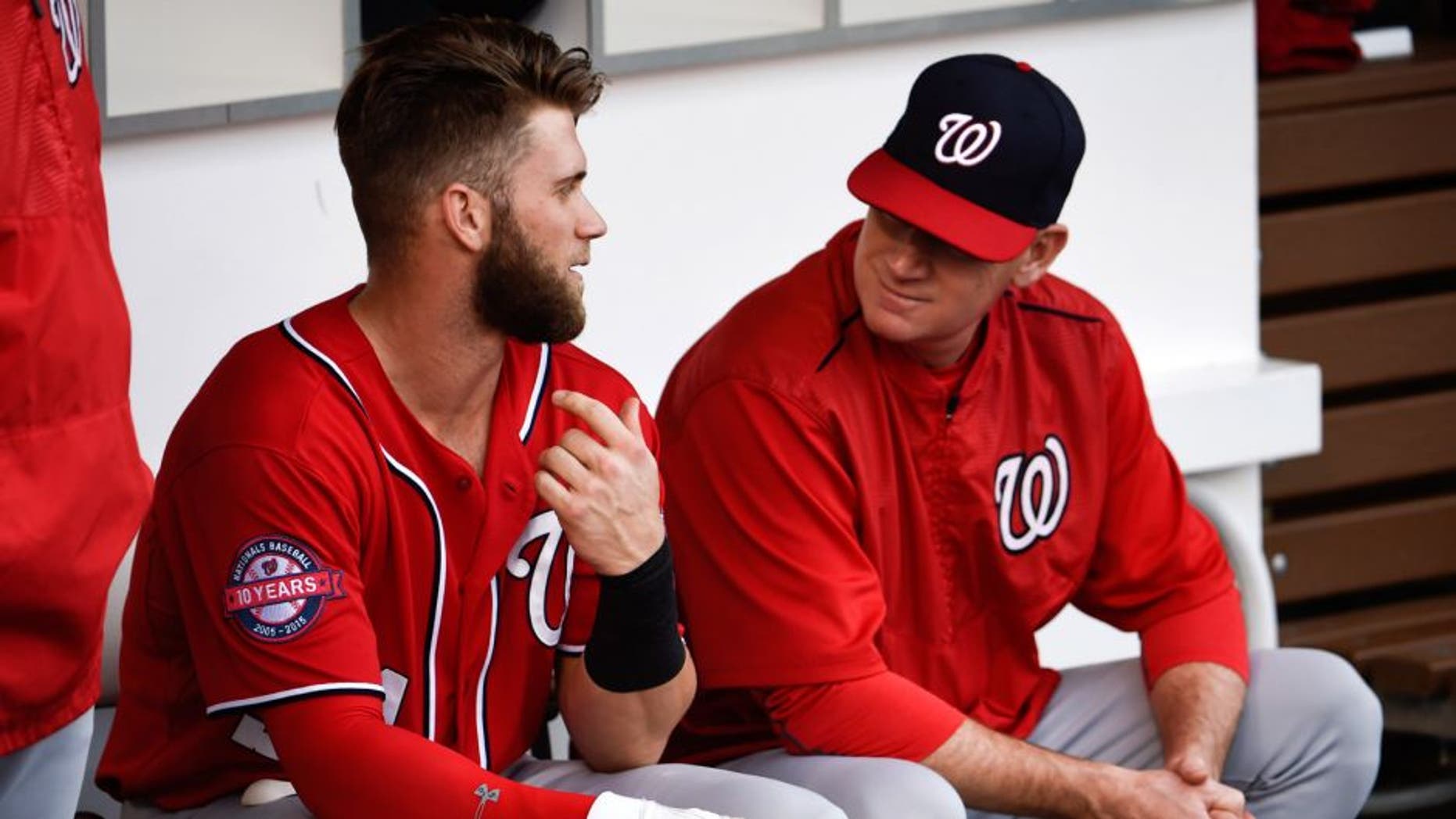 SAN DIEGO, CA - MAY 16: Bryce Harper #34 of the Washington Nationals, left, talks with Matt Williams #9 before a baseball game against the San Diego Padres at Petco Park May 16, 2015 in San Diego, California. (Photo by Denis Poroy/Getty Images)