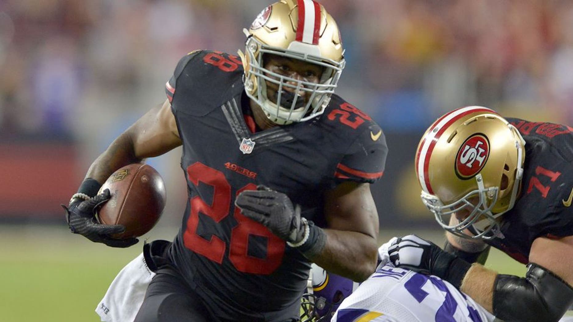 Sep 14, 2015; Santa Clara, CA, USA; San Francisco 49ers running back Carlos Hyde (28) carries the ball against the Minnesota Vikings at Levi's Stadium. Mandatory Credit: Kirby Lee-USA TODAY Sports
