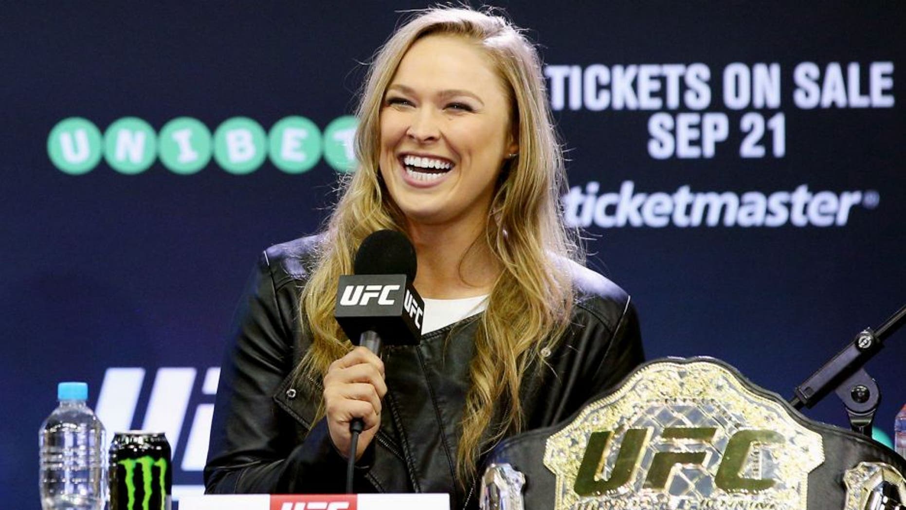 MELBOURNE, AUSTRALIA - SEPTEMBER 16: Ronda Rousey, UFC Women's Bantamweight Champion, reacts during the UFC 193 media event at Etihad Stadium on September 16, 2015 in Melbourne, Australia. (Photo by Michael Dodge/Zuffa LLC/Zuffa LLC via Getty Images)