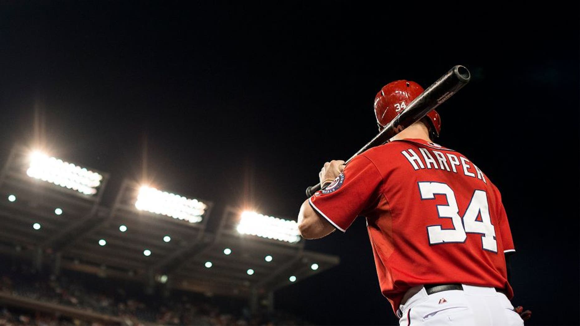 WASHINGTON, DC - AUGUST 22: Bryce Harper #34 of the Washington Nationals stands on deck before batting against the Milwaukee Brewers in the seventh inning of a baseball game at Nationals Park on August 22, 2015 in Washington, DC. (Photo by Patrick McDermott/Washington Nationals/Getty Images)