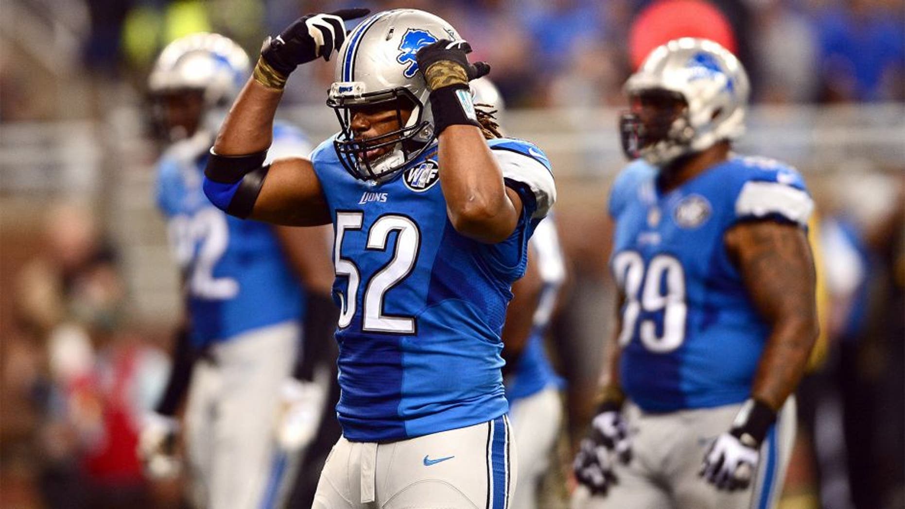 Nov 9, 2014; Detroit, MI, USA; Detroit Lions defensive end Darryl Tapp (52) against the Miami Dolphins at Ford Field. Mandatory Credit: Andrew Weber-USA TODAY Sports