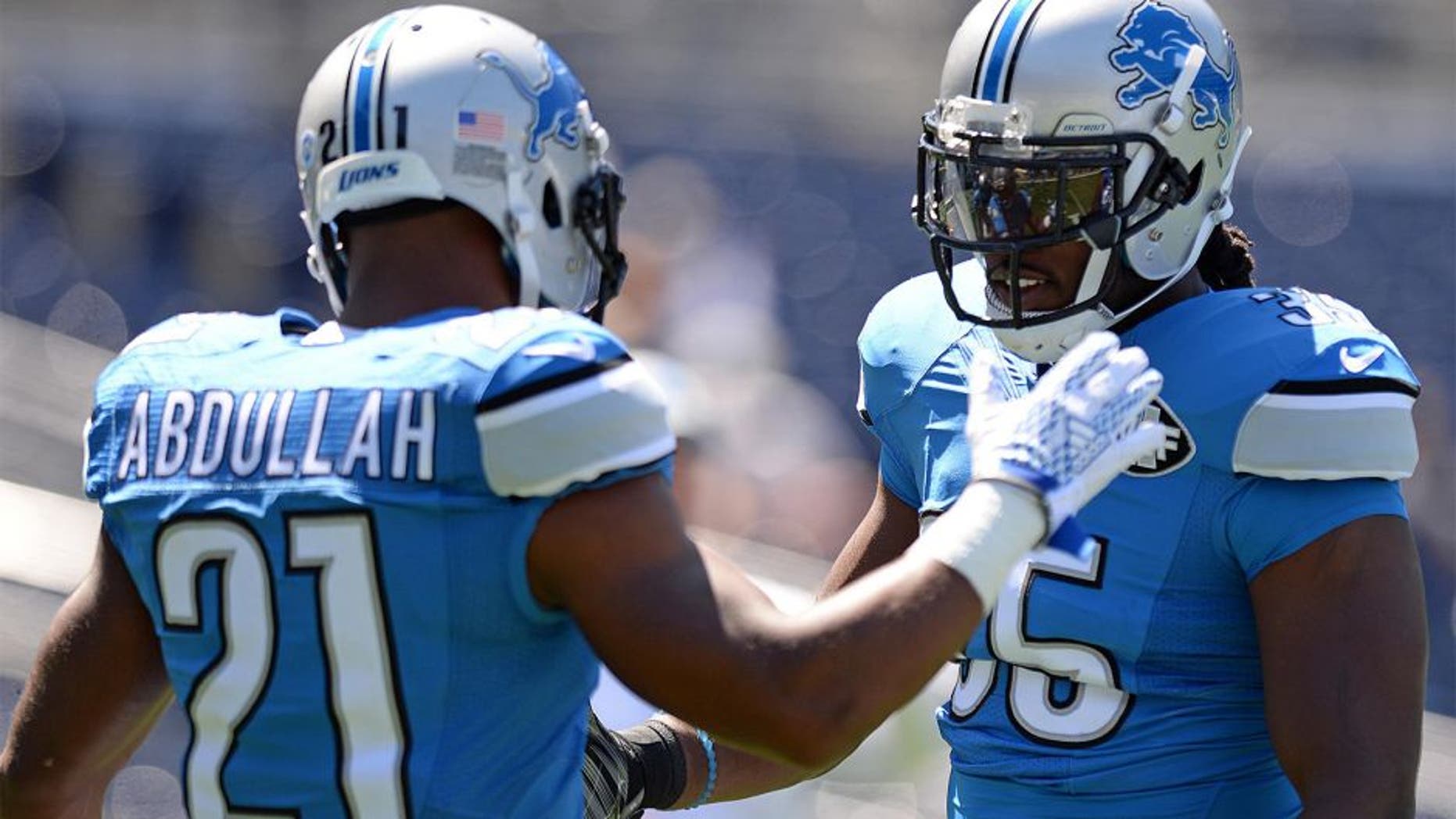 Sep 13, 2015; San Diego, CA, USA; Detroit Lions running back Joique Bell (35) and running back Ameer Abdullah (21) give each other five before the game against the San Diego Chargers at Qualcomm Stadium. Mandatory Credit: Jake Roth-USA TODAY Sports