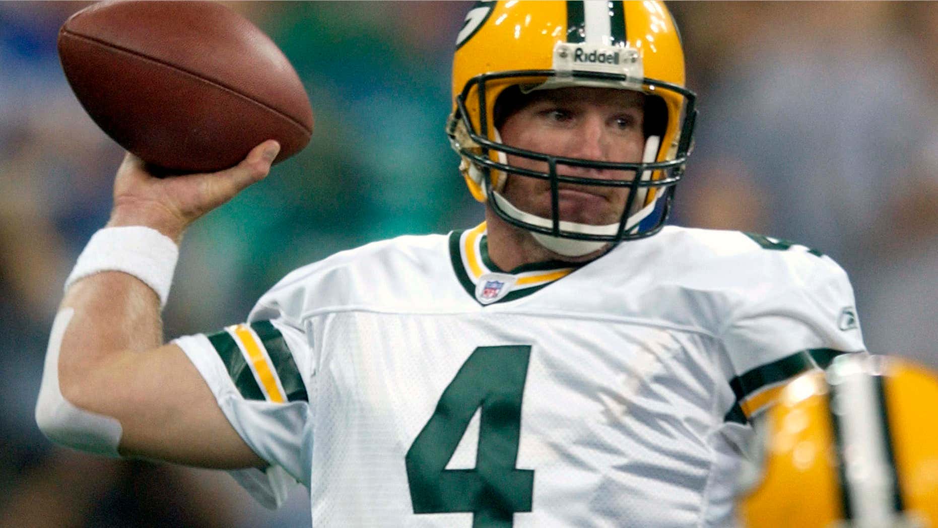 FILE - In this Sunday, Sept. 26, 2004 file photo, Green Bay Packers quarterback Brett Farve throws a pass in the first quarter against the Indianapolis Colts in Indianapolis.