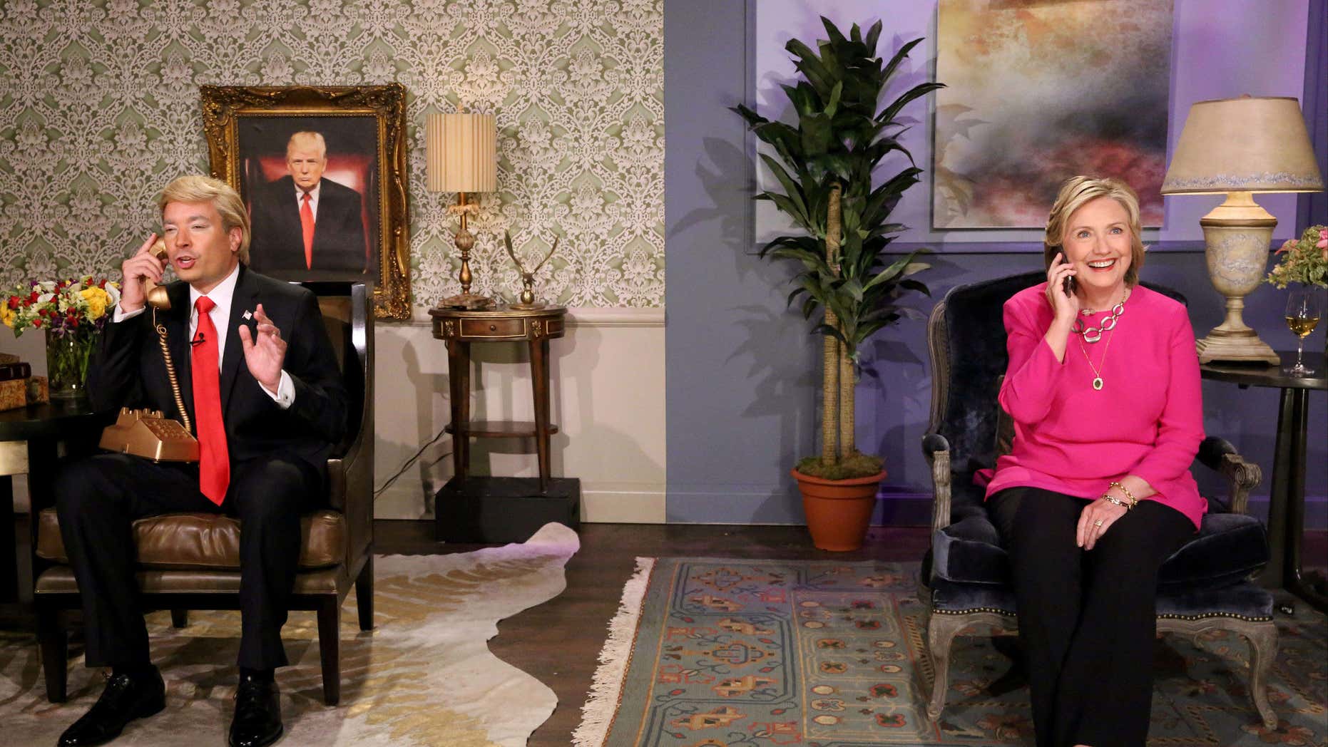 In this image released by NBC, host Jimmy Fallon, portraying Donald Trump, left, and Hillary Rodham Clinton appear during a skit titled, "Trump calls Hillary" during a taping of "The Tonight Show Starring Jimmy Fallon," on Wednesday, Sept. 16, 2015, in New York.