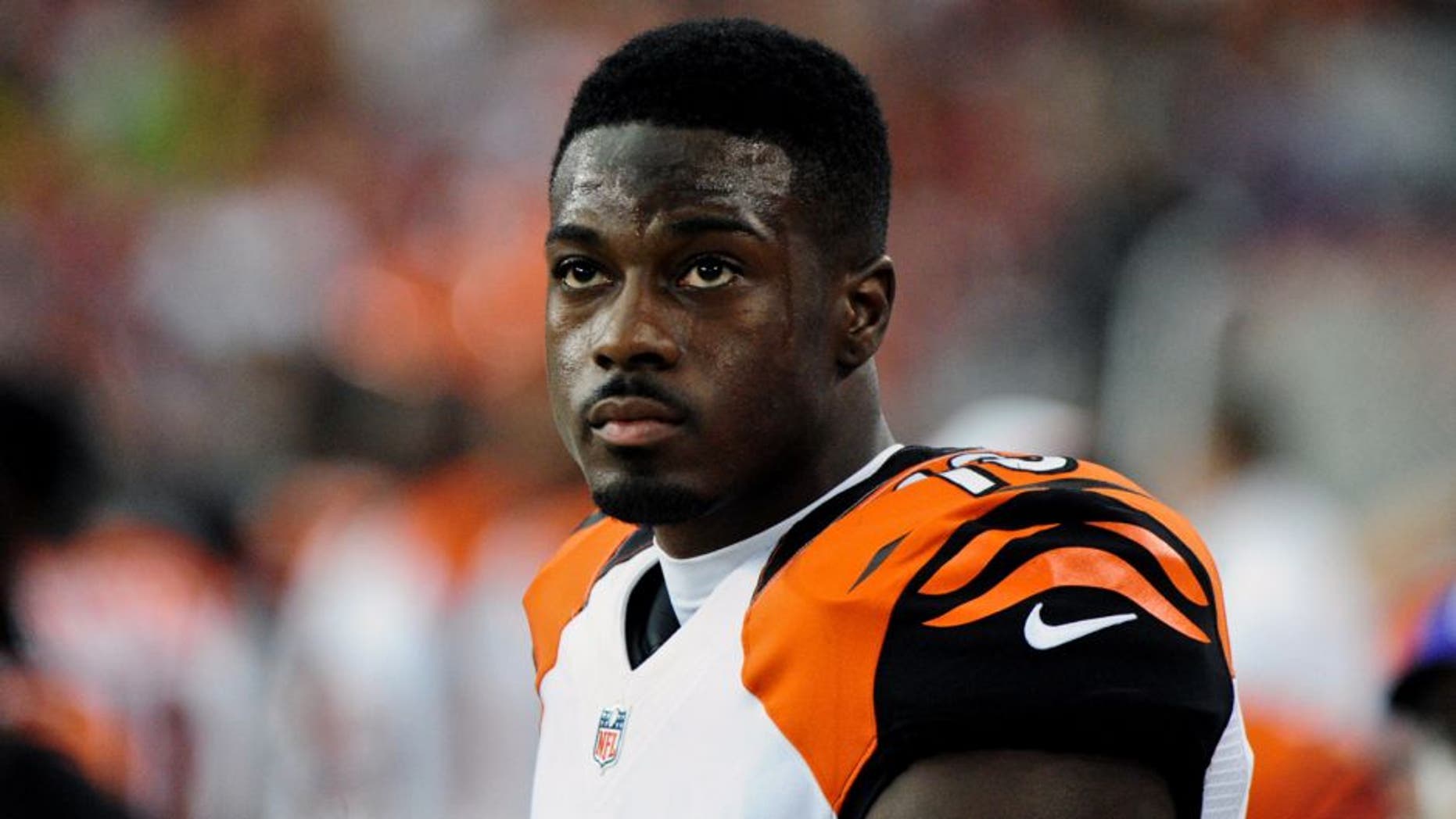Aug 24, 2014; Glendale, AZ, USA; Cincinnati Bengals wide receiver A.J. Green (18) looks on during the first half against the Arizona Cardinals at University of Phoenix Stadium. Mandatory Credit: Matt Kartozian-USA TODAY Sports