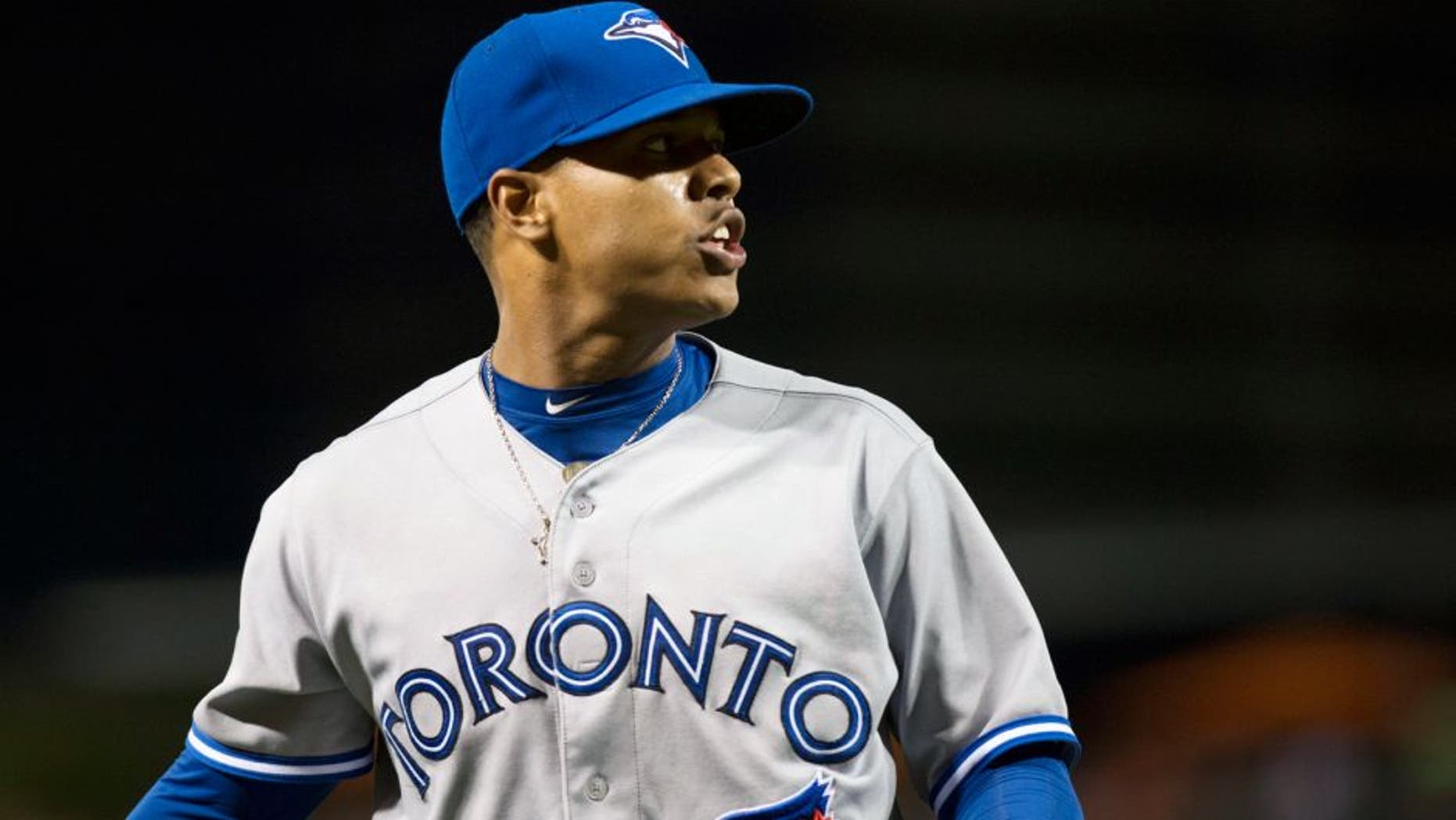 Sep 15, 2014; Baltimore, MD, USA; Toronto Blue Jays starting pitcher Marcus Stroman (54) yells at the Baltimore Orioles bench as he walks off the field after the sixth inning at Oriole Park at Camden Yards. Baltimore Orioles defeated Toronto Blue Jays 5-2. Mandatory Credit: Tommy Gilligan-USA TODAY Sports
