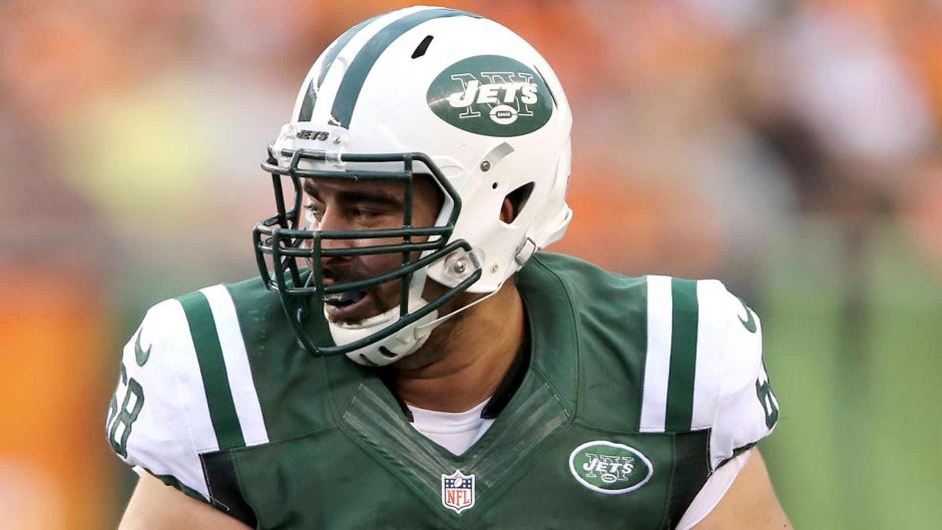 CINCINNATI, OH - AUGUST 16: OL Breno Giacomini #68 of the New York Jets moves to block in the game against the Cincinnati Bengals at Paul Brown Stadium on August 16, 2014 in Cincinnati, Ohio. (Photo by Al Pereira/New York Jets/Getty Images)