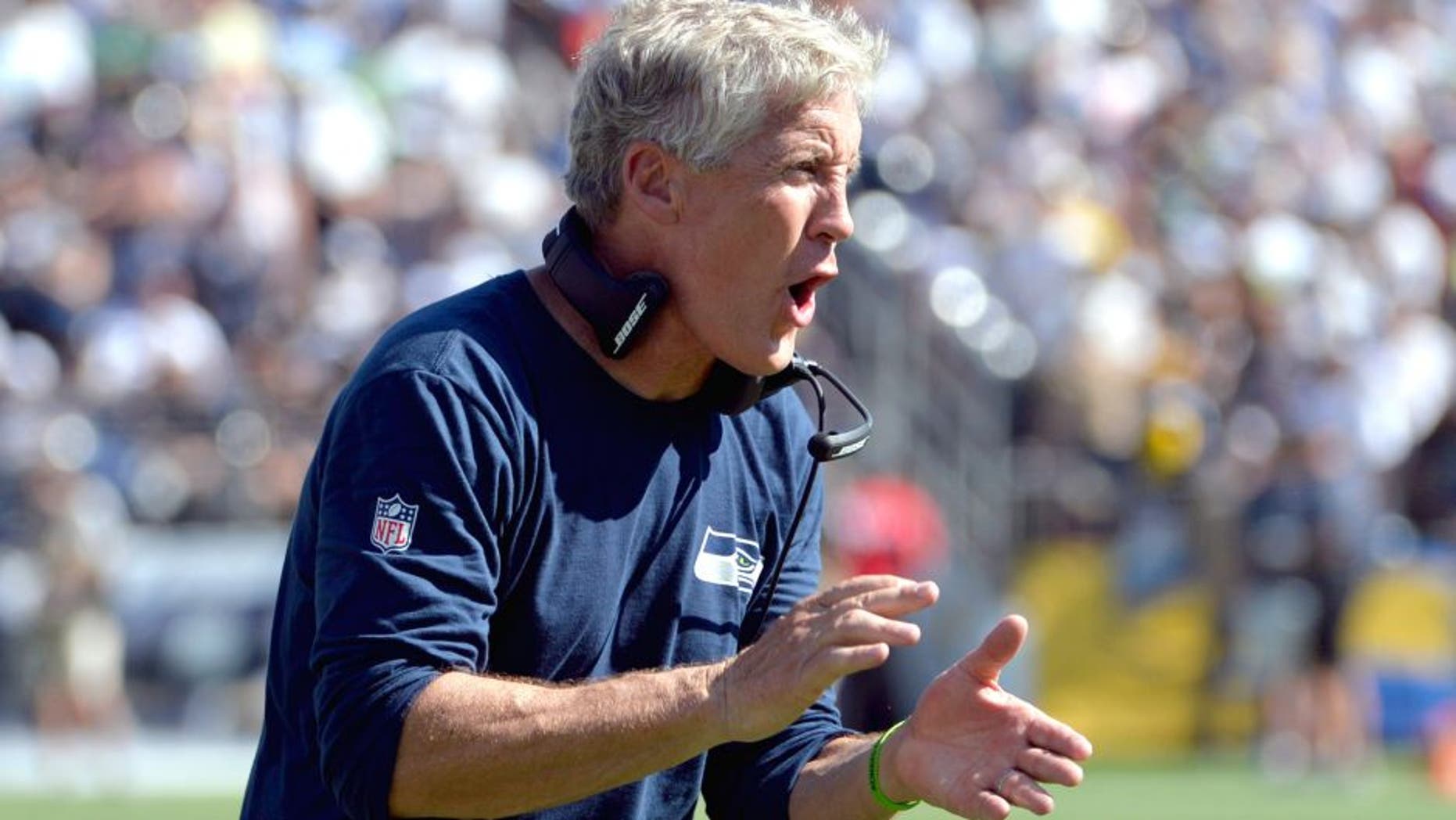 Sep 14, 2014; San Diego, CA, USA; Seattle Seahawks head coach Pete Carroll reacts to a third quarter touchdown against the San Diego Chargers at Qualcomm Stadium. Mandatory Credit: Robert Hanashiro-USA TODAY Sports